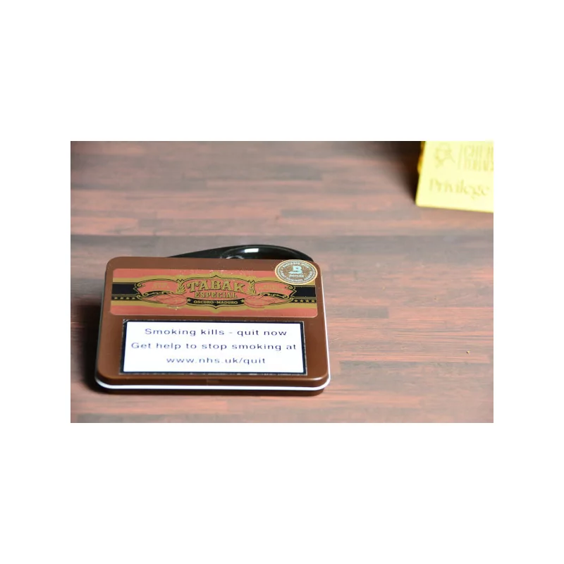 Empty small cigar tin tabak